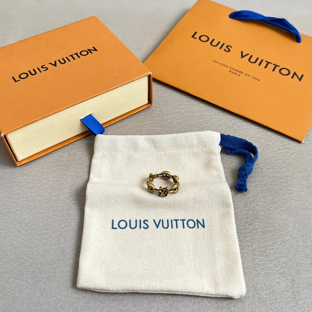 Louis Vuitton jewelry pouch with chain bracelet and attached charm ring