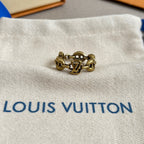 Louis Vuitton gold-tone chain bracelet with LV charm detail