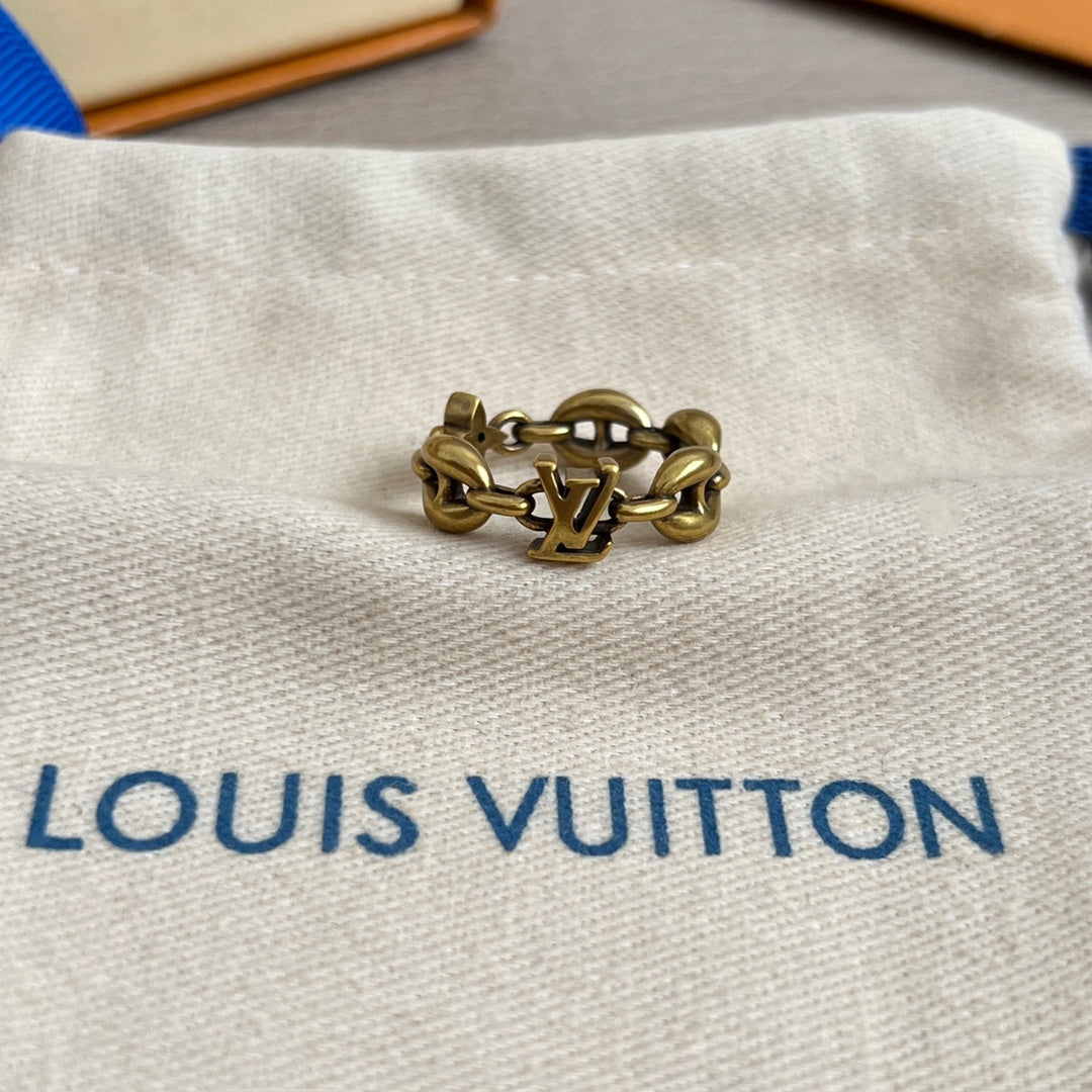 Louis Vuitton gold-tone chain bracelet with LV charm detail