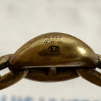 Gold-tone bracelet back with 925 stamp and small LV mark