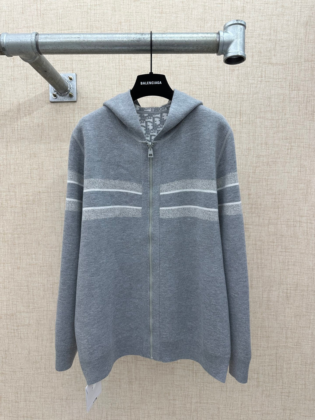 Heather gray zip hoodie with hood, central zipper and striped panel accents
