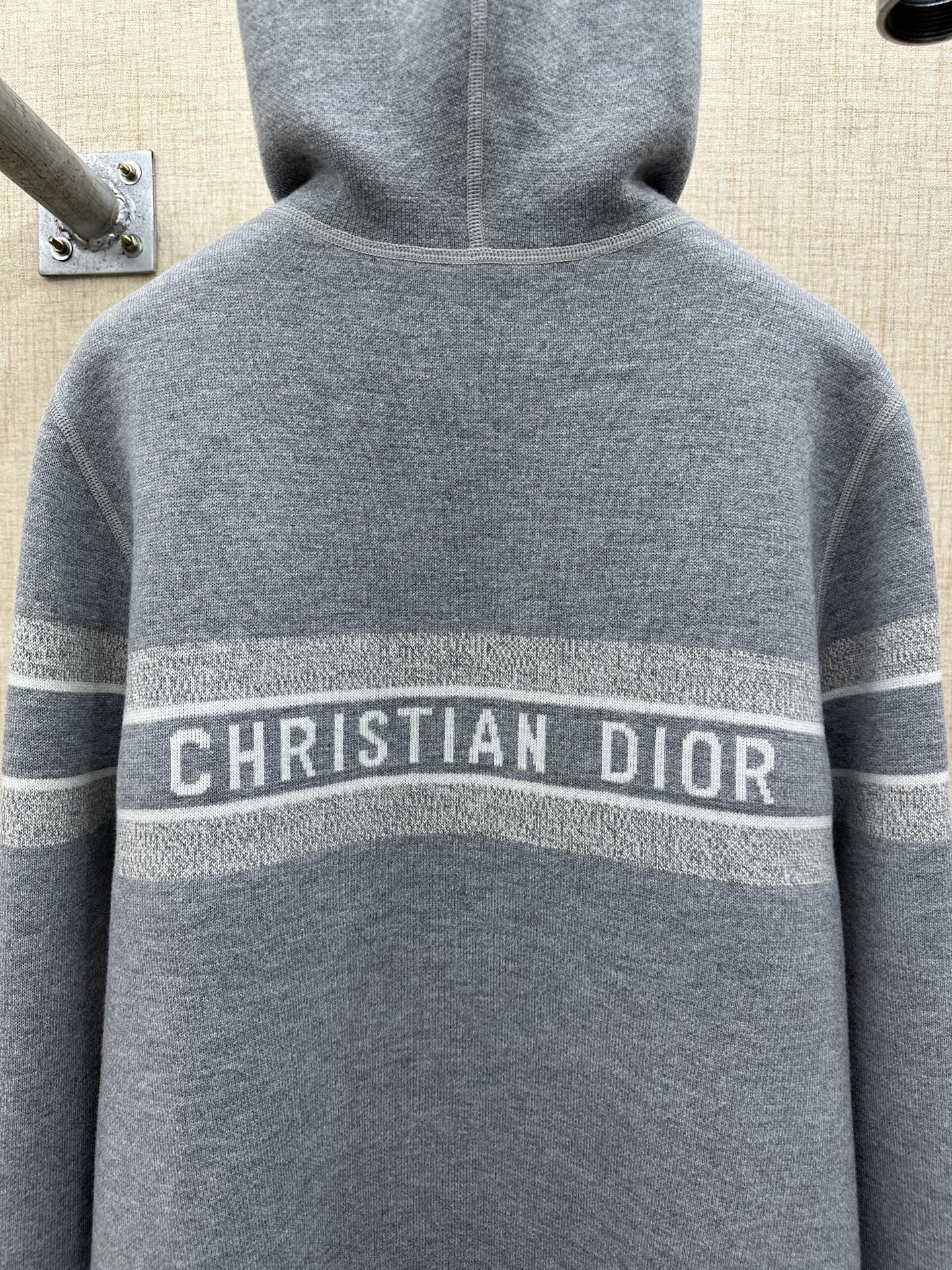 Heather gray zip hoodie back view with hood and Christian Dior logo band