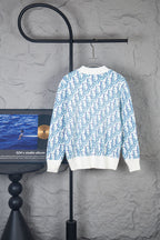 Dior long-sleeve knit sweater with white knit and blue repeating logo pattern