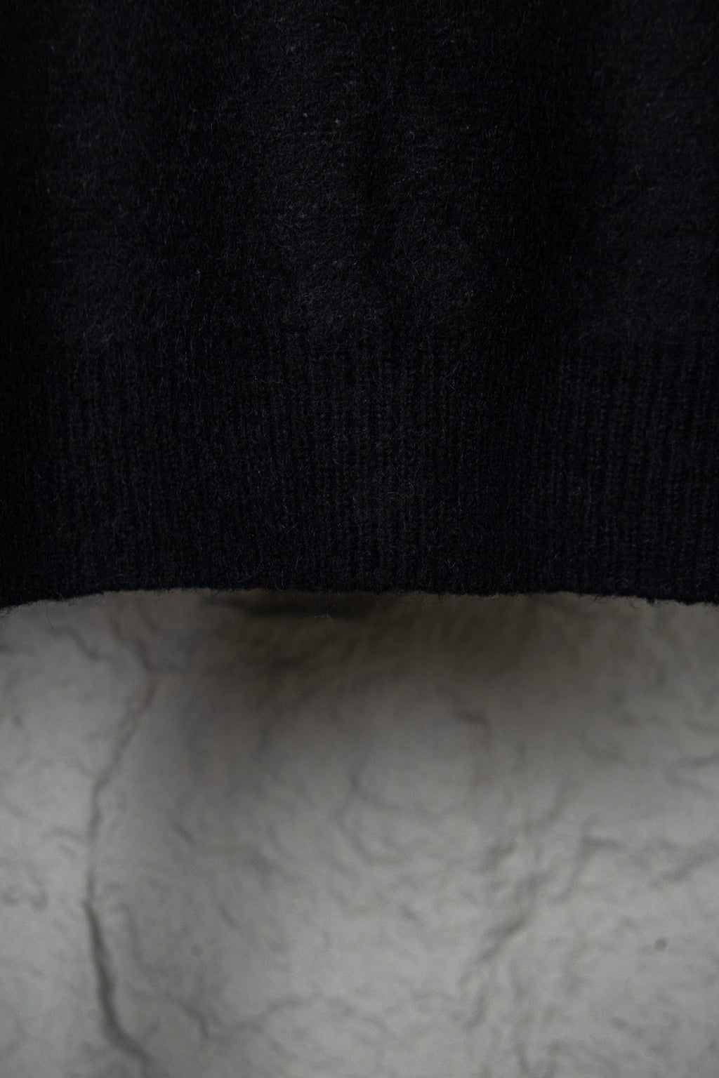 Louis Vuitton sweater hem and knit texture, ribbed band at bottom