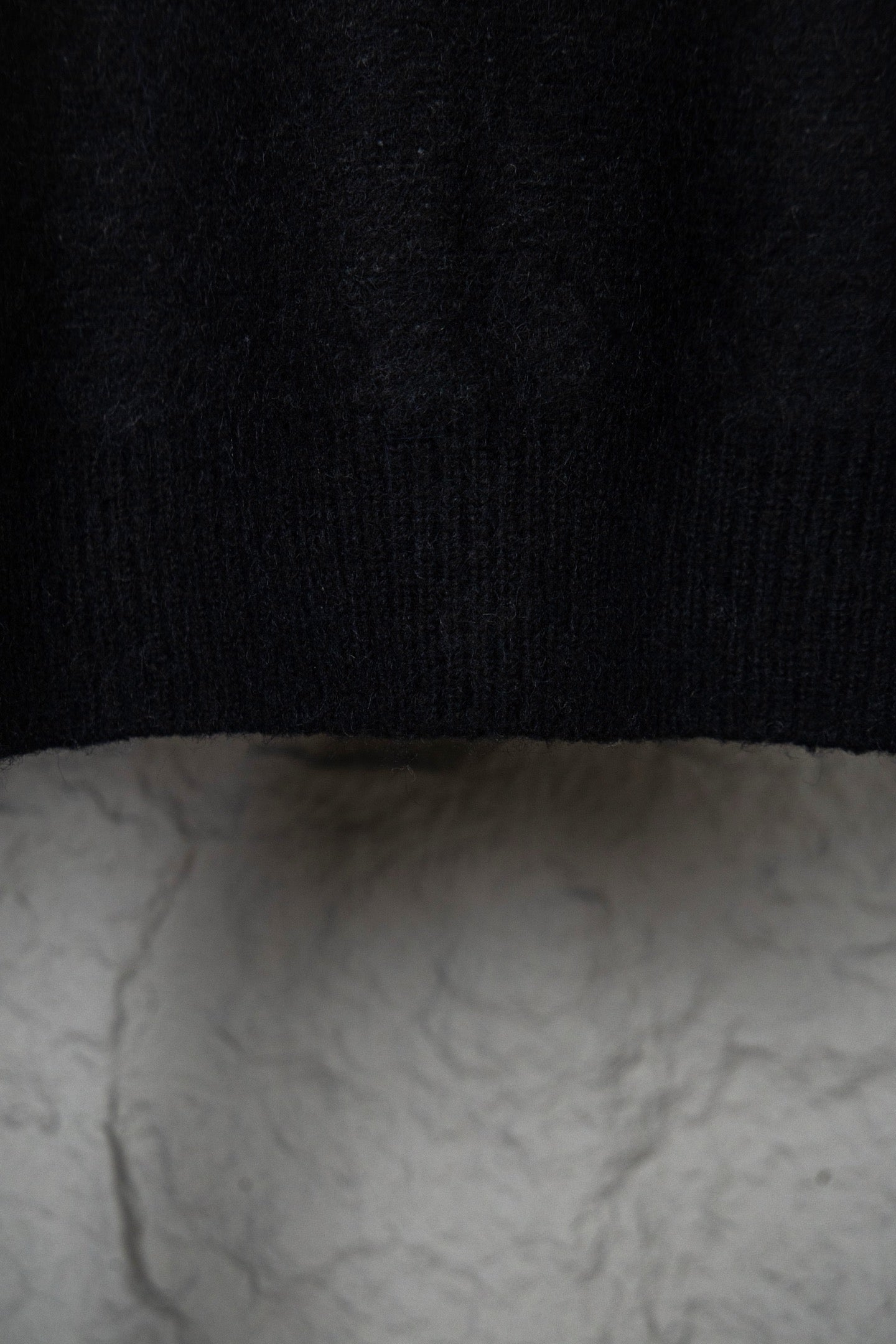 Louis Vuitton sweater hem and knit texture, ribbed band at bottom