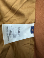 Louis Vuitton care label and size tag stitched inside brown jacket lining