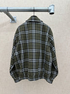Olive green plaid jacket back view with stand collar and elastic hem
