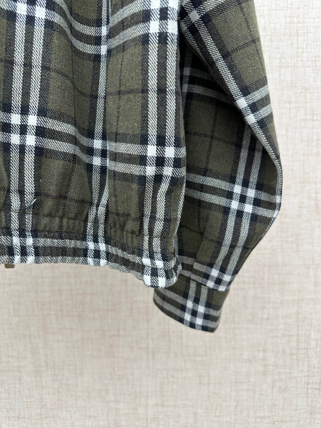 Long plaid coat with stand collar and buttoned front
