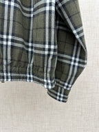 Long plaid coat with stand collar and buttoned front