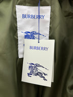Olive green jacket lining with Burberry tag and hanging fabric label