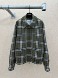 Olive green plaid zip jacket with stand collar, front pockets, and elastic cuffs