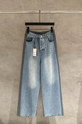 Balenciaga light blue wide-leg denim pants with patch pockets and elastic waistband