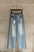Balenciaga light blue wide-leg denim pants with patch pockets and elastic waistband
