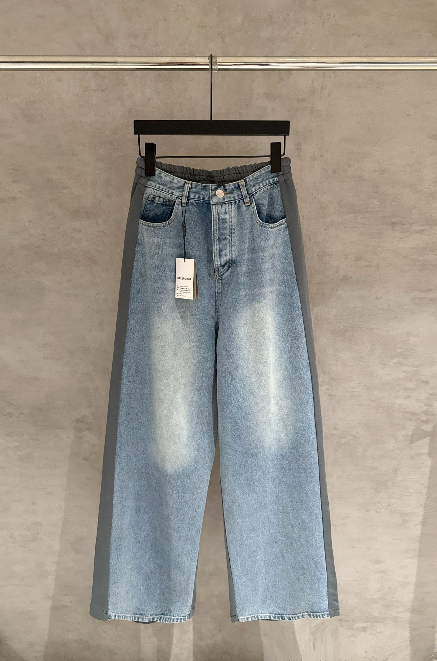 Balenciaga light blue wide-leg denim pants with patch pockets and elastic waistband