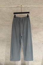 Balenciaga slate gray wide-leg pants with elastic waistband and side slit