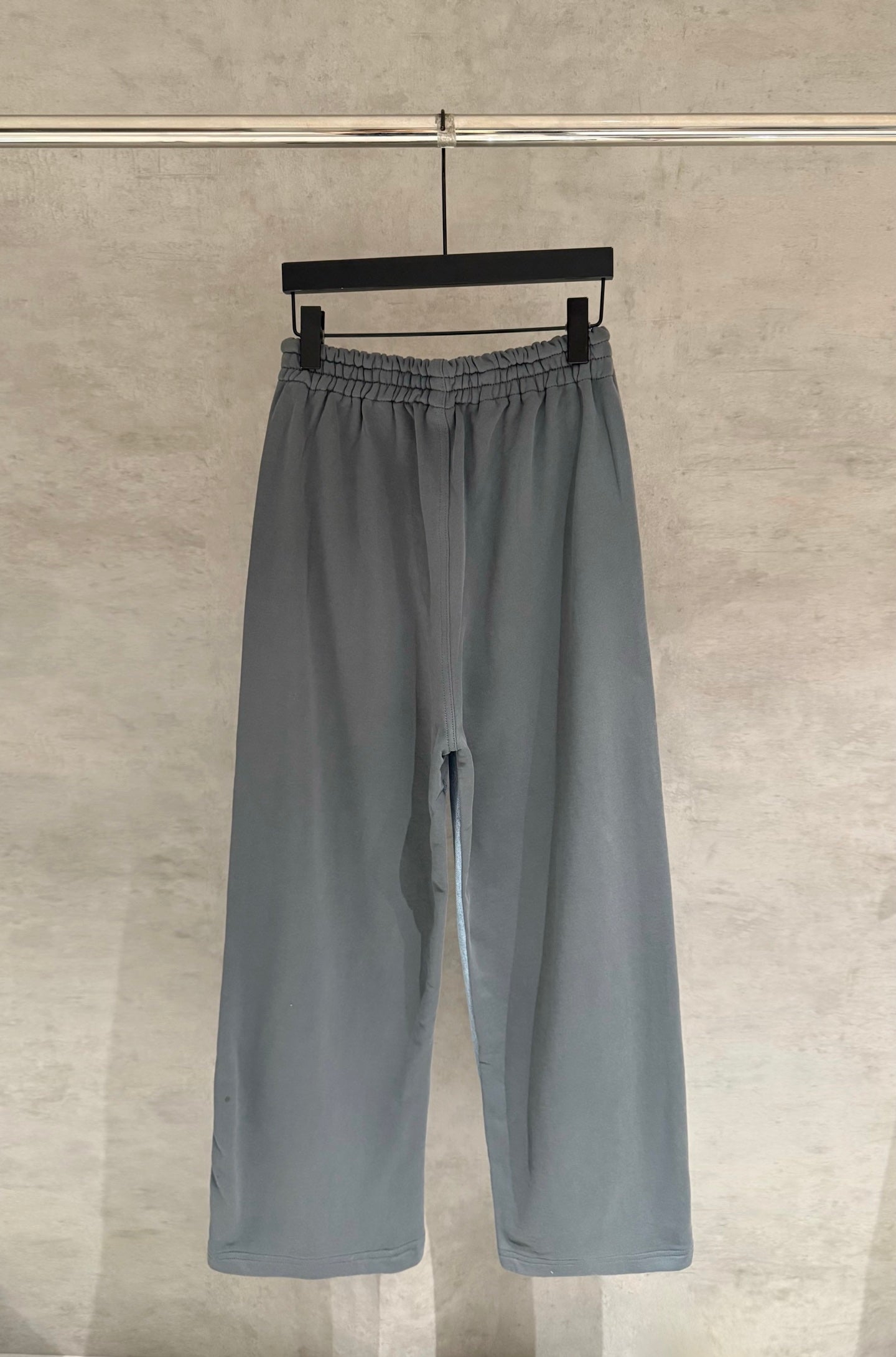 Balenciaga slate gray wide-leg pants with elastic waistband and side slit