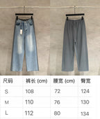 Balenciaga pants pair side by side: light blue and gray, with size chart below