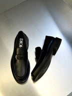 Dark leather Dior loafers with D buckle on vamp and branding on inner lining