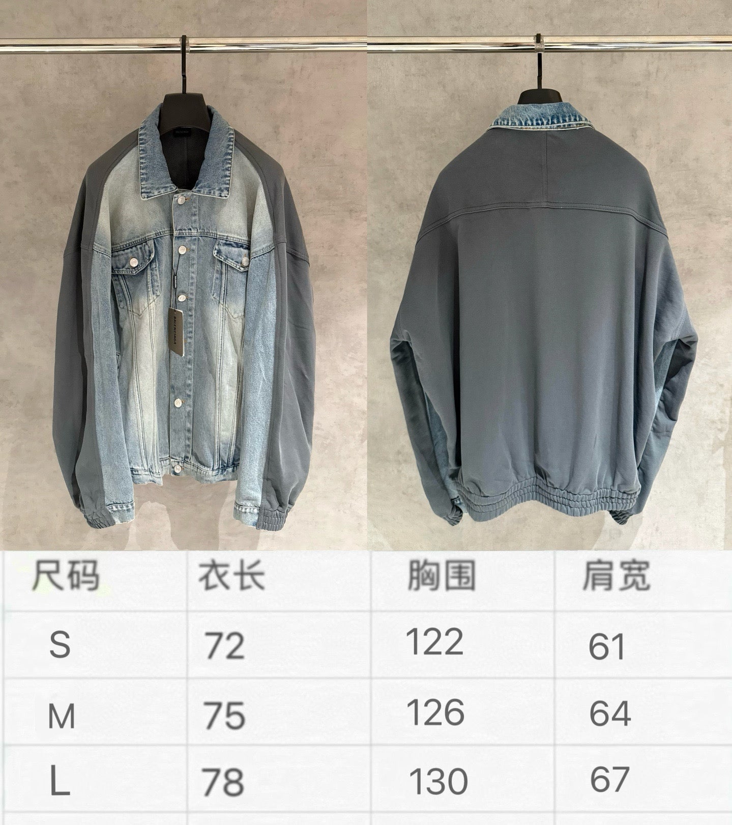 Denim-and-charcoal jacket front and back on hangers with size chart