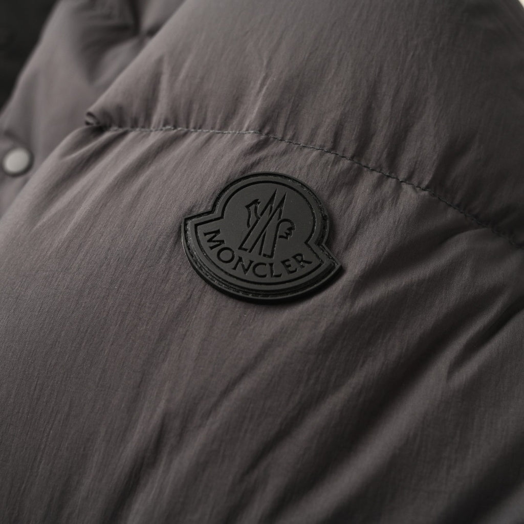 Long puffer jacket patch logo on front, with quilted fabric and button