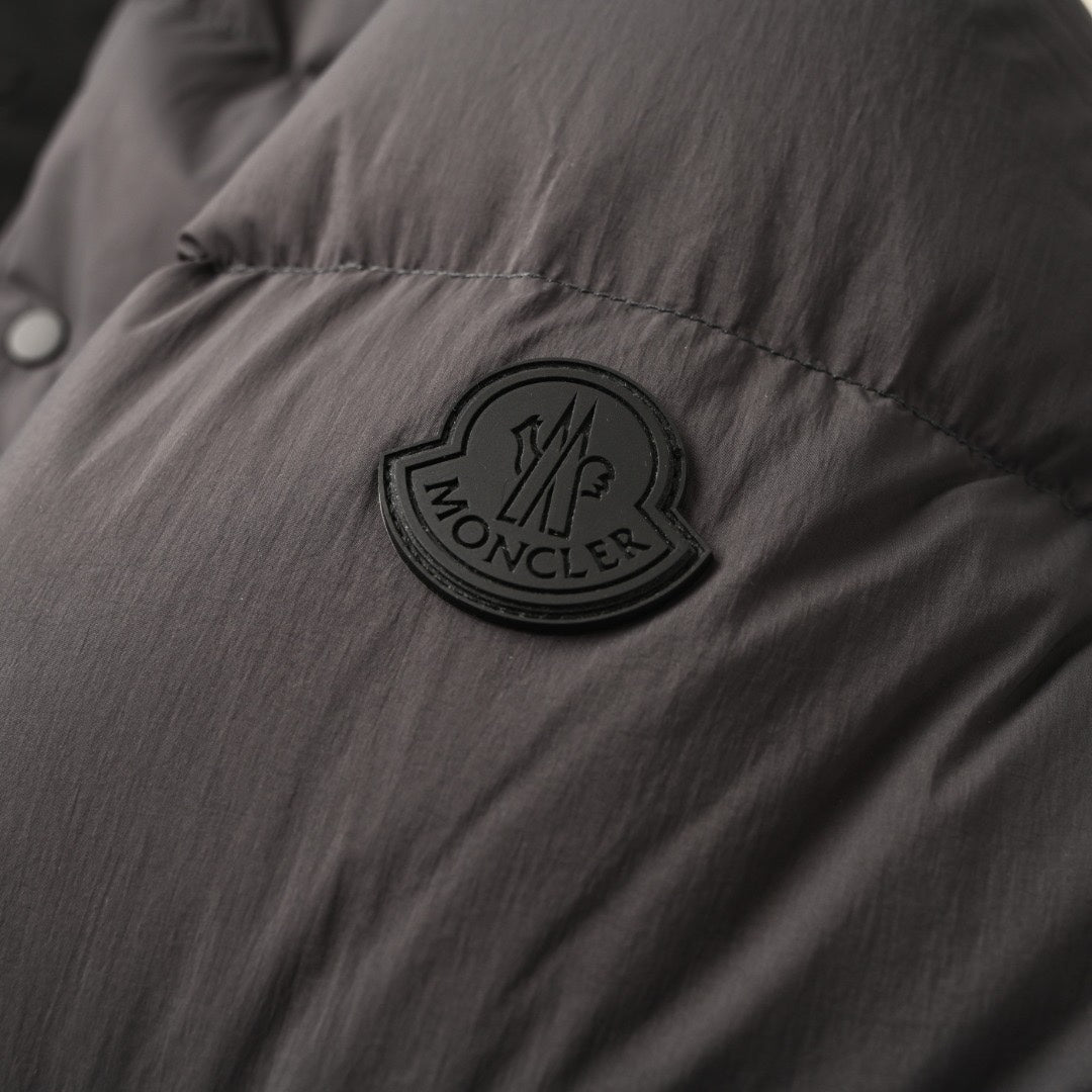 Long puffer jacket patch logo on front, with quilted fabric and button