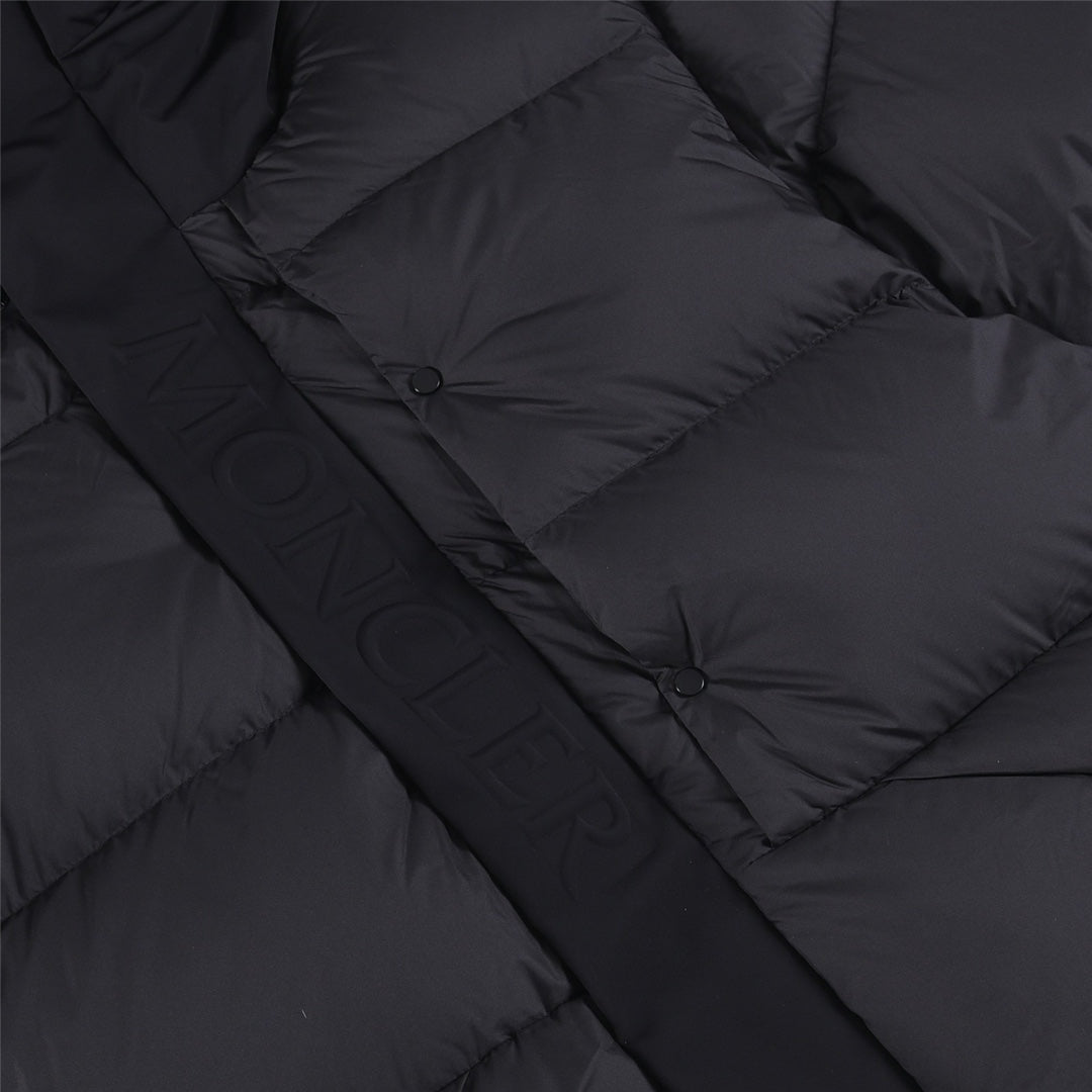 Quilted puffer jacket front with buttoned placket, dark color
