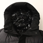 Long puffer jacket hood and front opening, dark interior lining close-up