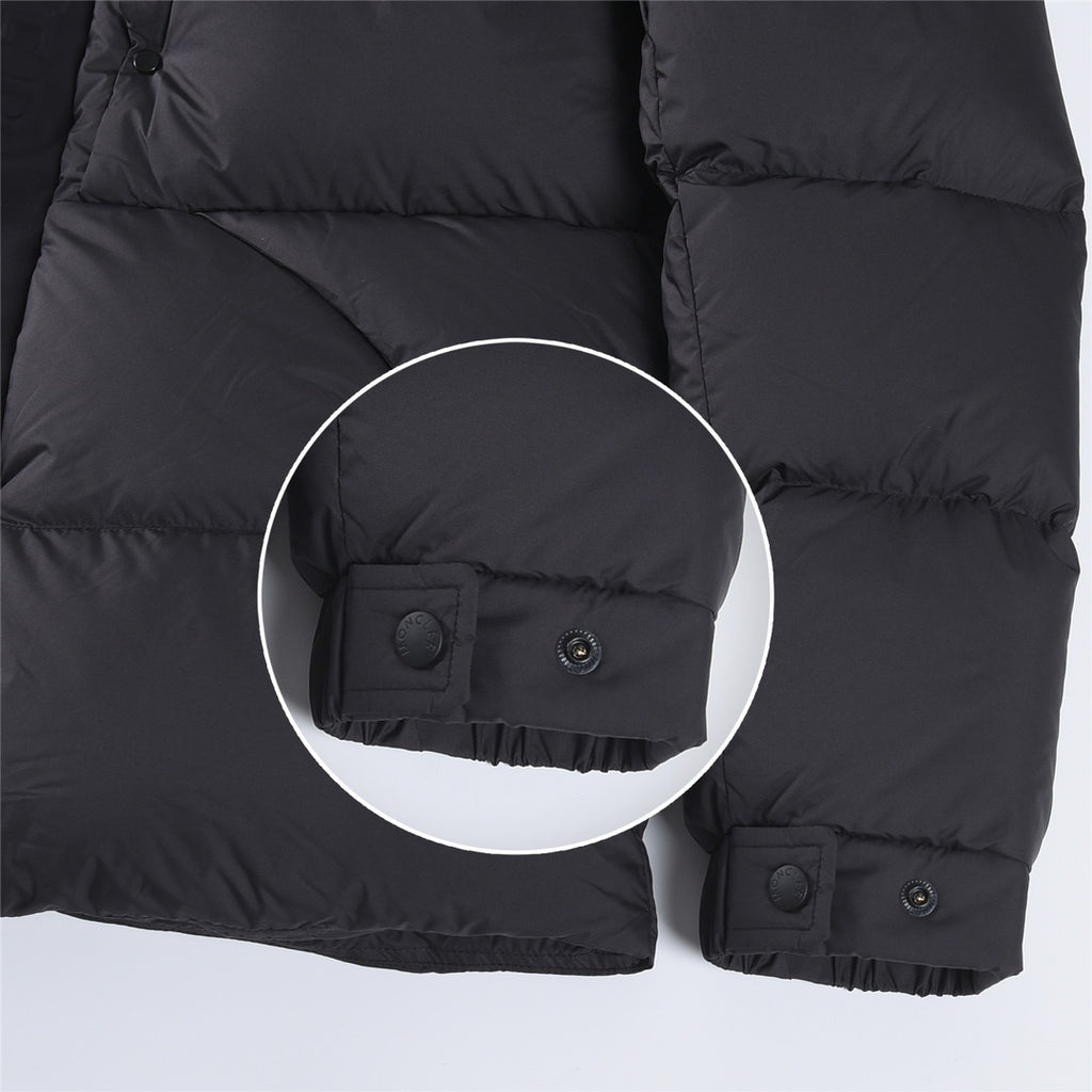 Puffer jacket cuffs with snap tabs and elastic, dark color
