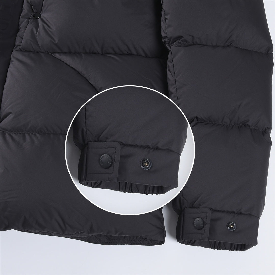Puffer jacket cuffs with snap tabs and elastic, dark color