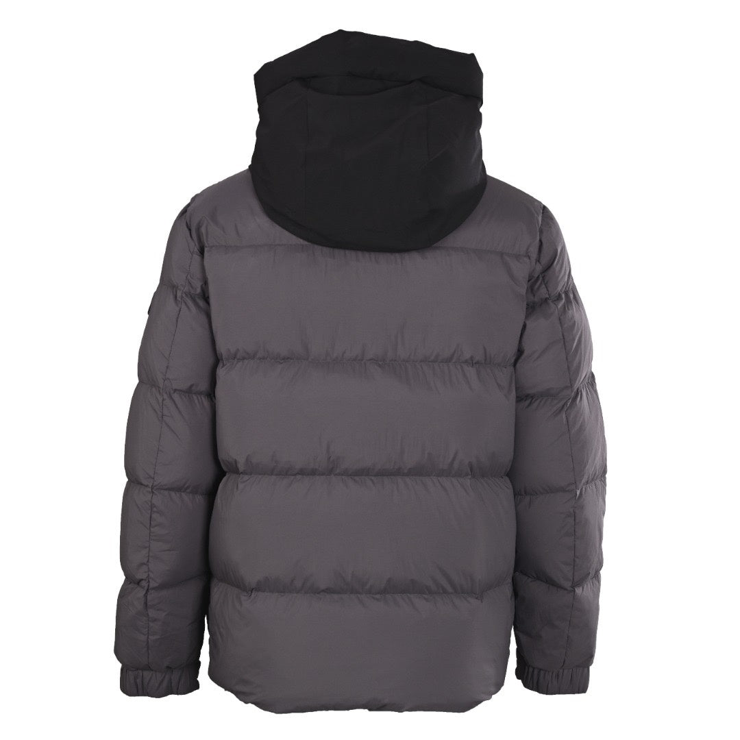 Dark gray long puffer jacket, back view with large hood and quilted panels