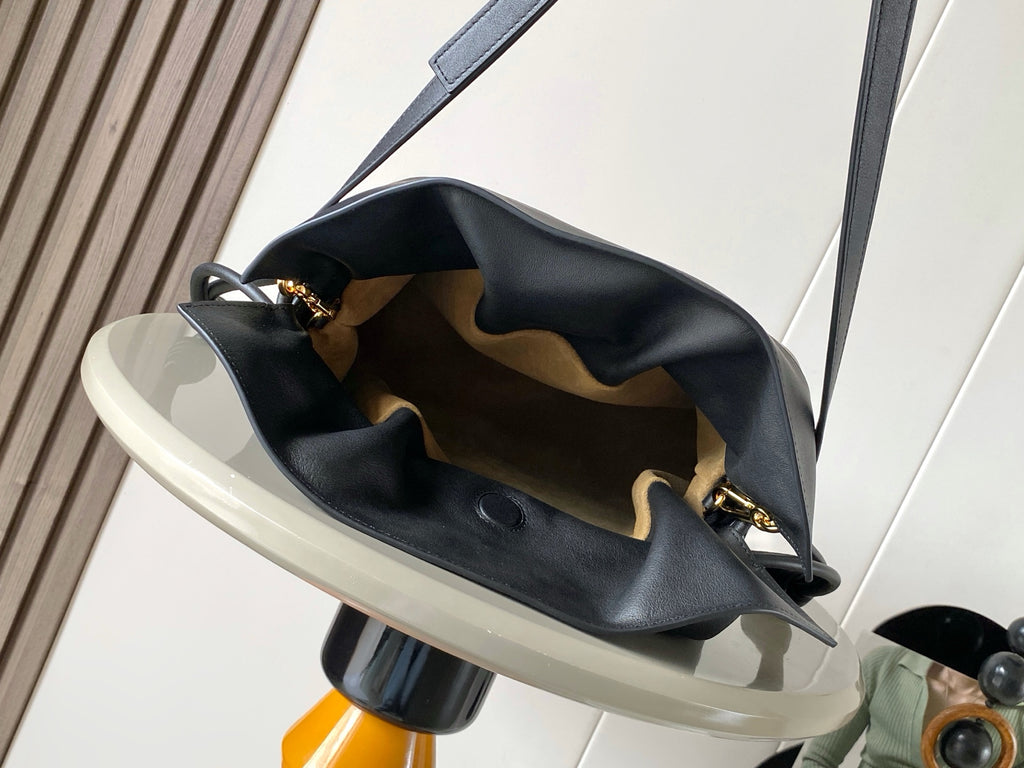 Loewe leather bucket bag open top with black lining and gold hardware