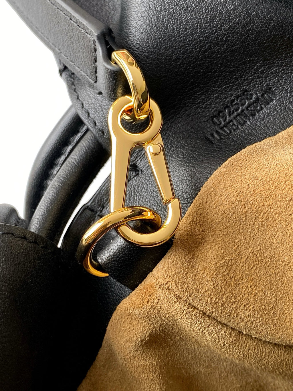 Loewe leather bag clasp with gold-tone ring and black strap