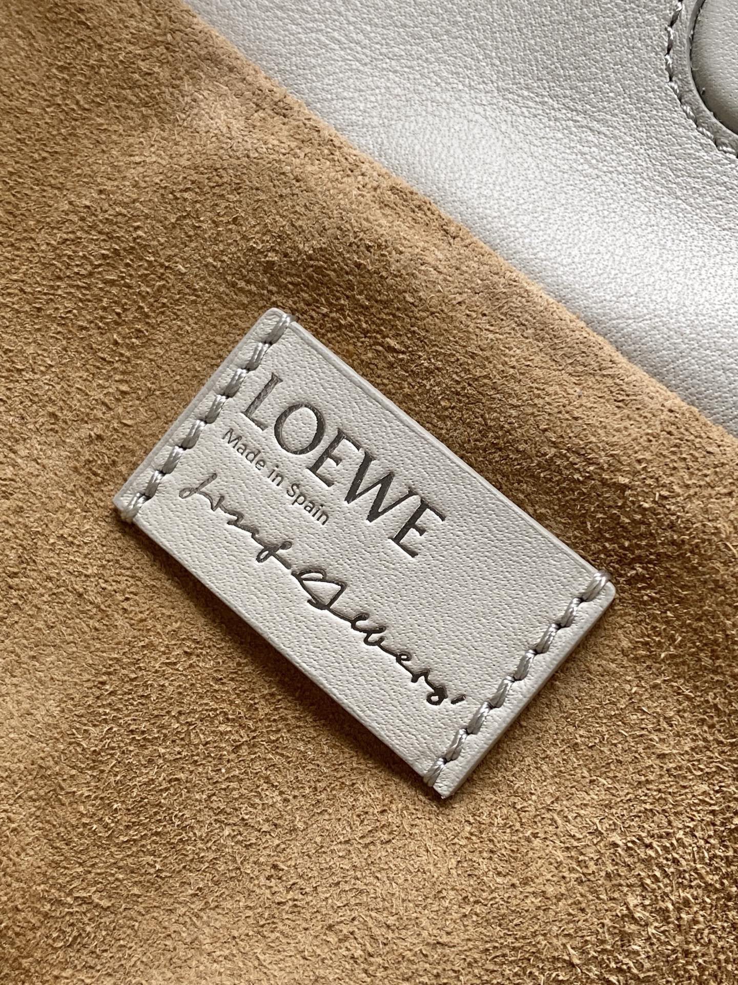 Loewe tag on tan suede lining with "Made in Spain" text