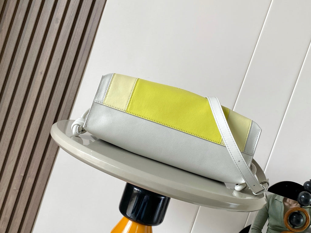 Loewe bag with lime center panel, white leather body and structured top