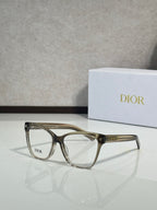 Black eyeglass frames with clear lenses and logo on temple
