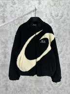Black shearling-style jacket with off-white diagonal stripe and Balenciaga logo