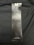 Balenciaga clothing size tag on black fabric