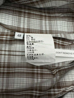 Garment size and fabric label with code 48 and care instructions