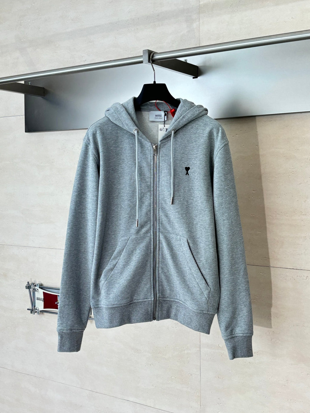 Amiri hoodie, light gray zip-up with hood and small black chest emblem