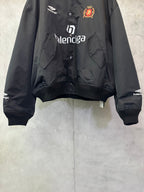 Balenciaga black bomber jacket with crest patch and front Balenciaga logo