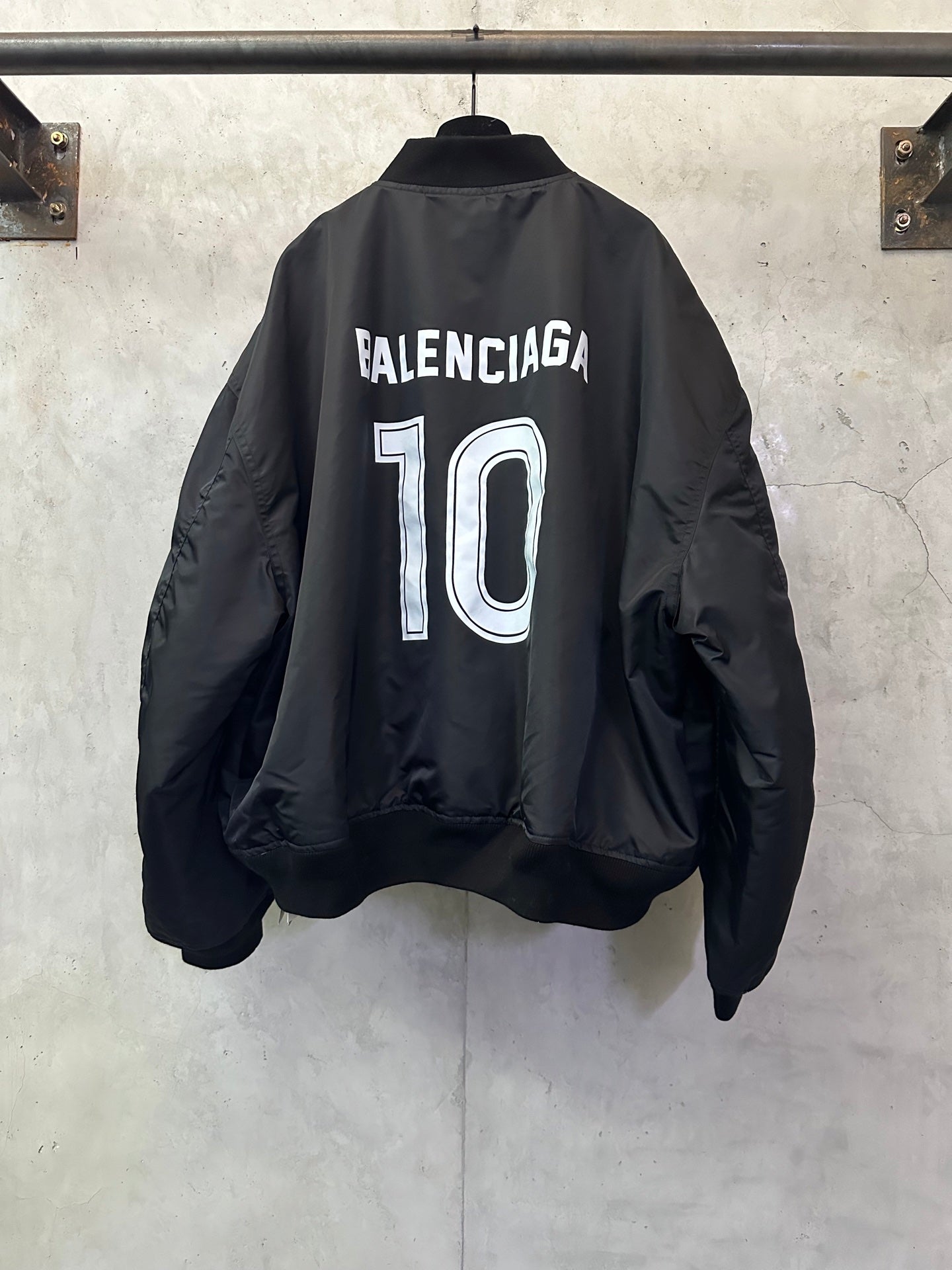 Balenciaga black bomber jacket with large '10' back print and button front