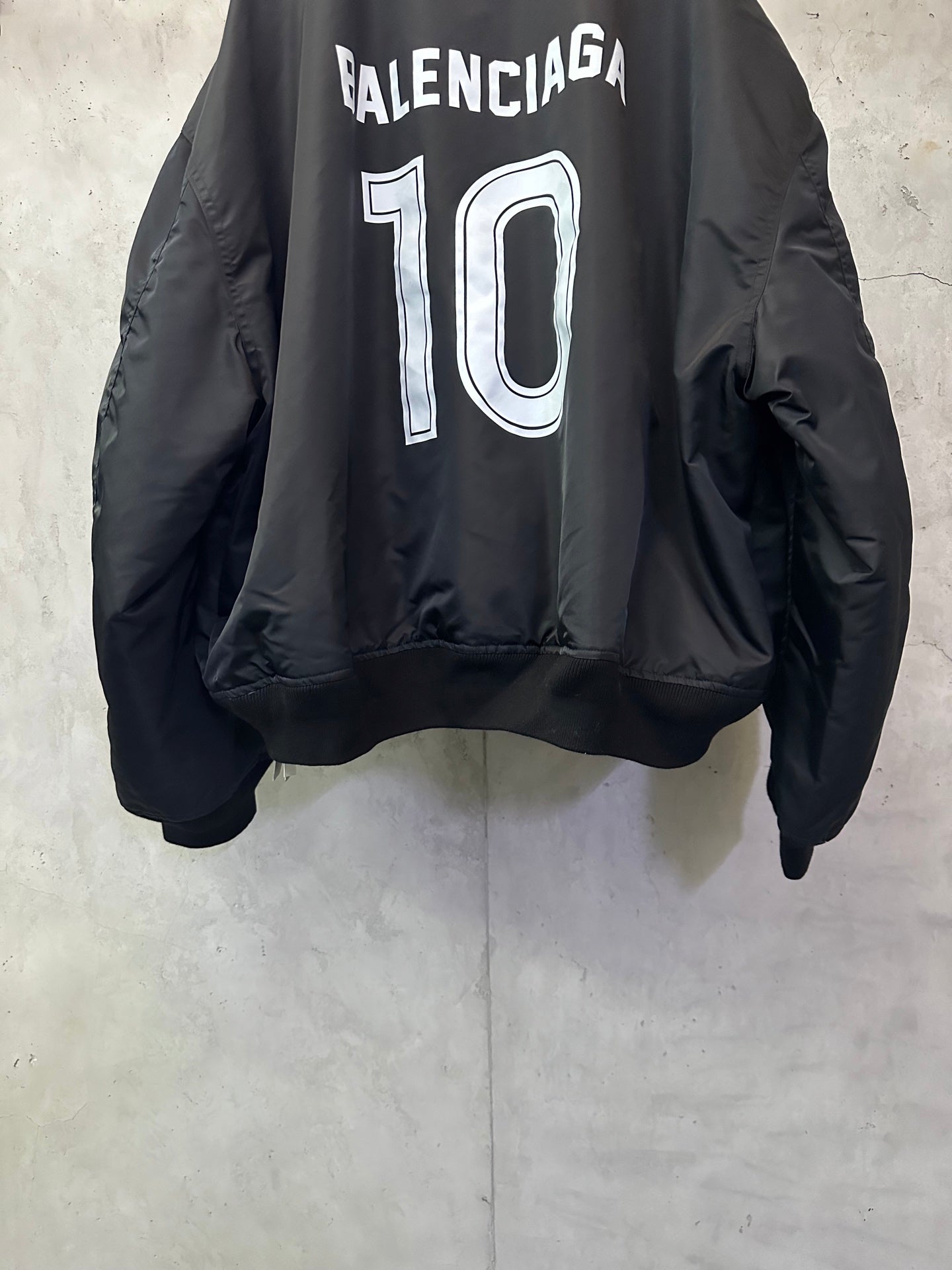 Balenciaga bomber jacket with oversized '10' back print and ribbed cuffs