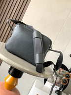 Loewe men’s leather crossbody bag in dark gray with flap and wide strap