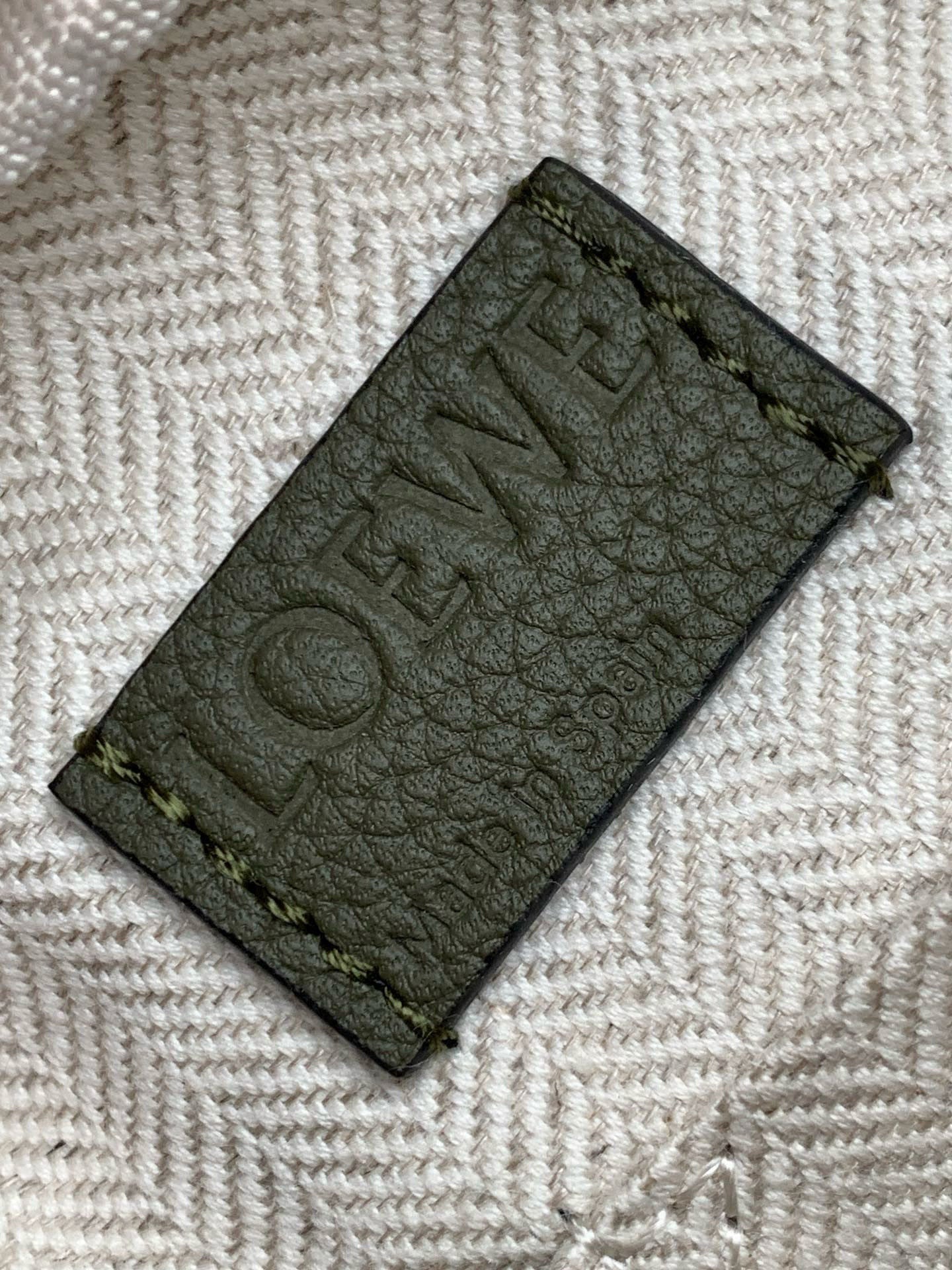 Loewe men olive leather patch, embossed logo design