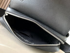 Loewe bag interior view: dark lined compartment with double zippers and zipper track.