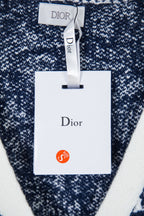 Knit cardigan with hanging Dior tag and navy-and-white speckled pattern