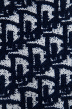 Navy-and-white knit fabric with allover geometric pattern texture