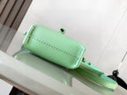 Loewe mint green leather bag with cylindrical top and front seam detail