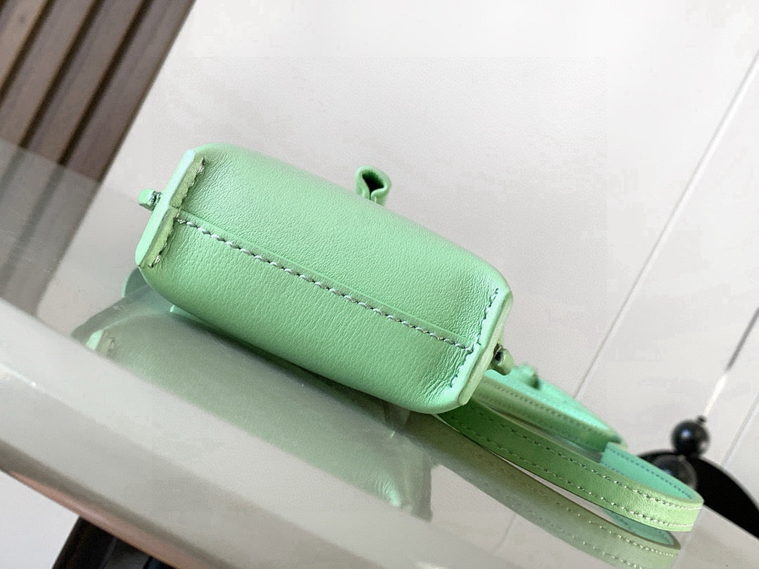 Loewe mint green leather bag with cylindrical top and front seam detail