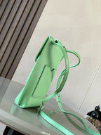 Loewe mint green leather mini bag, adjustable crossbody strap and top-handle loop